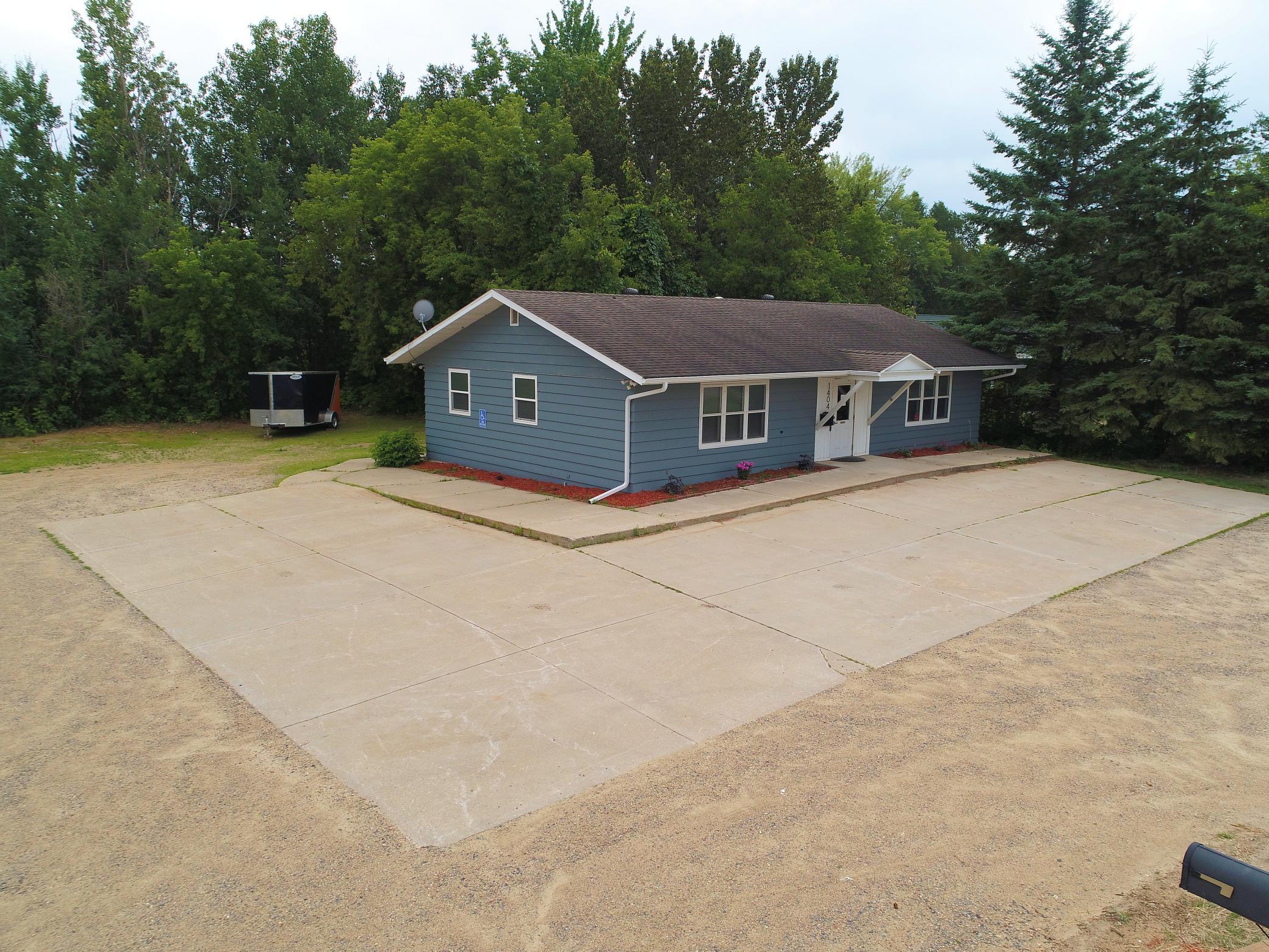 Front/side exterior, parking