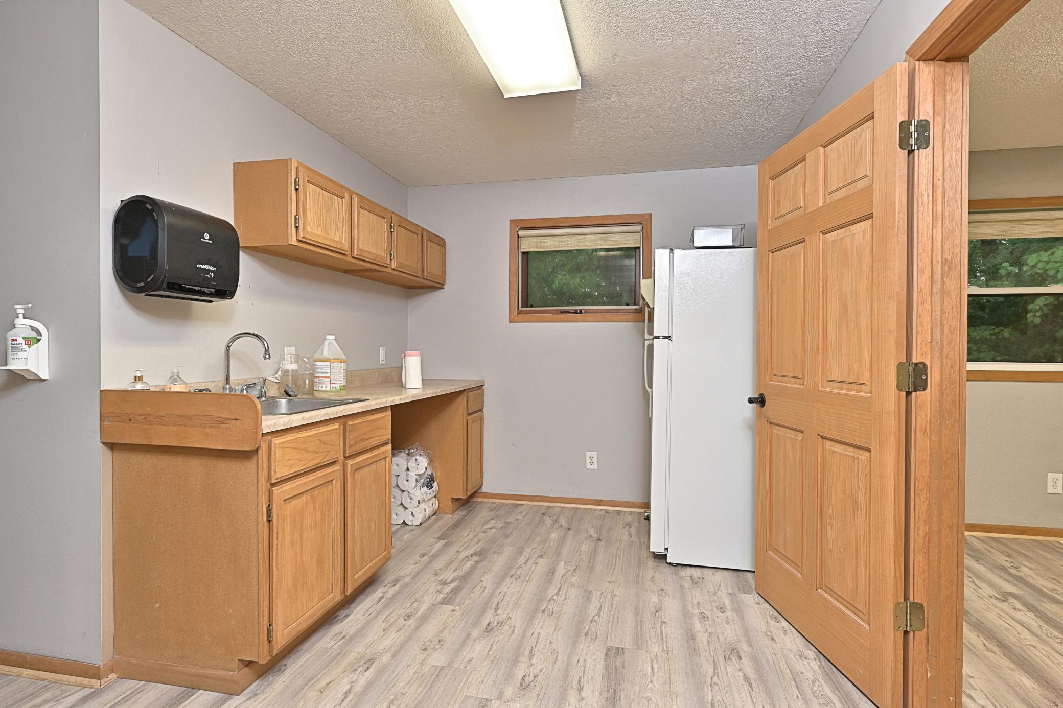 Wash station, storage cabinets