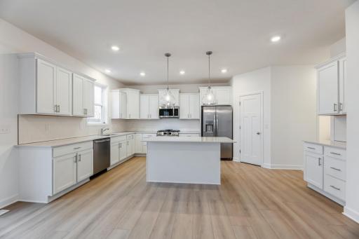 (All the following photos are of a similar home, actual finishes may vary.)
