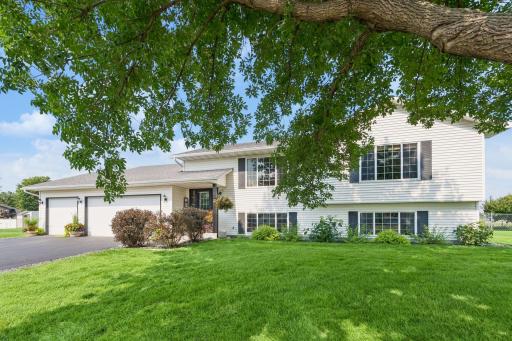 Enjoy small-town living with easy access to city amenities. New insulated garage doors add to the curb appeal of this much loved home.