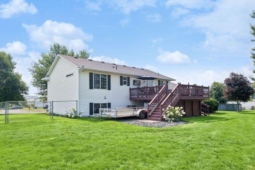 Fence has a large gate access to allow for trailer parking behind the house. Pet friendly neighborhood and a fenced yard with room to roam.