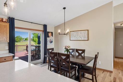 Bright dining area with easy access to the deck for easy grilling and entertaining.