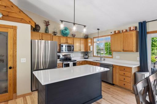 Spacious center island ideal for meal prep and entertaining. All appliance have been updated.