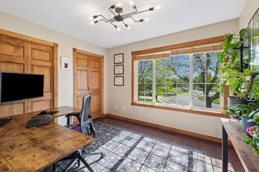 Second bedroom on the main level. Paneled doors throughout most of the home add to the custom feel.