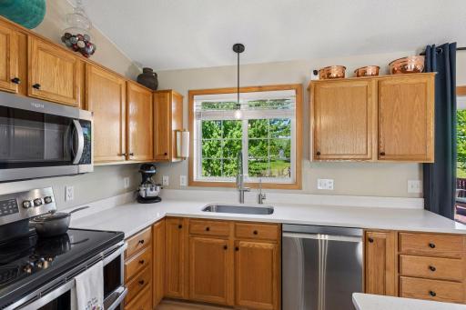 Updated kitchen with stunning quartz countertops, new sink and fixtures. The sink also has reverse osmosis system that is rented from Culligan. Culligan supplies the filters with the contract and for a carefree ownership experience.