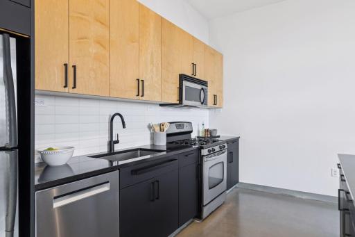 Updated quartz countertop, deep sink, and fixture.