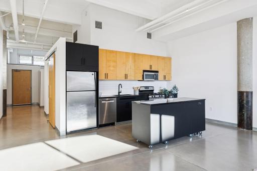Updated kitchen with subway tile backsplash.