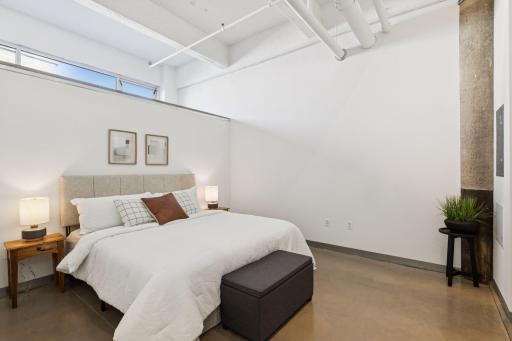 Generous primary bedroom with room for a king-sized bed.