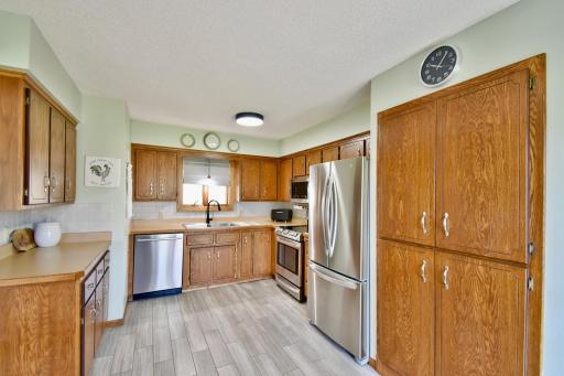 Kitchen with Kitchen window and Large Pantry Cabinets