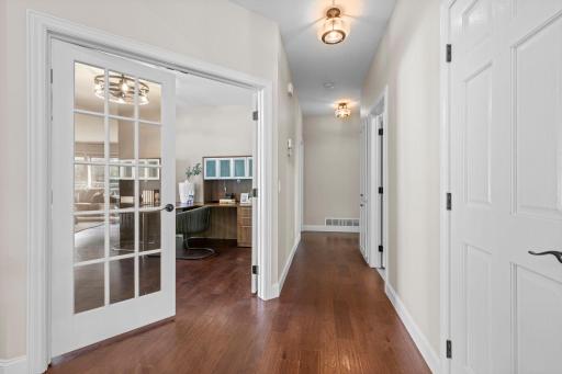 Beautiful French doors lead to the front office.