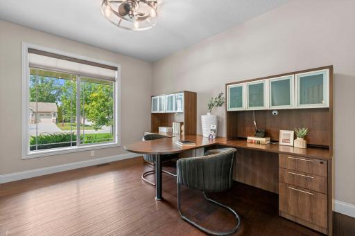 Office located off the foyer, perfect for a home office or flexible living space.