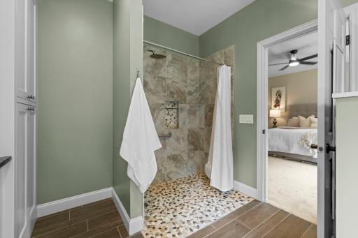 Beautiful tile shower in the Primary bathroom.