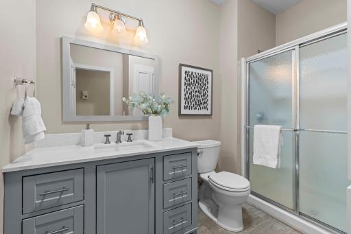 Recently updated 3/4 bathroom serving the main level.