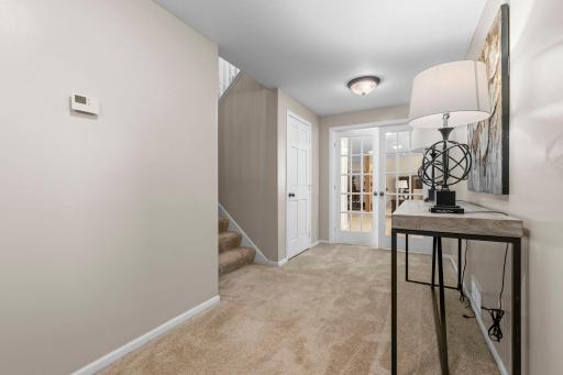 Beautiful french doors leading you to the lower lever family room.
