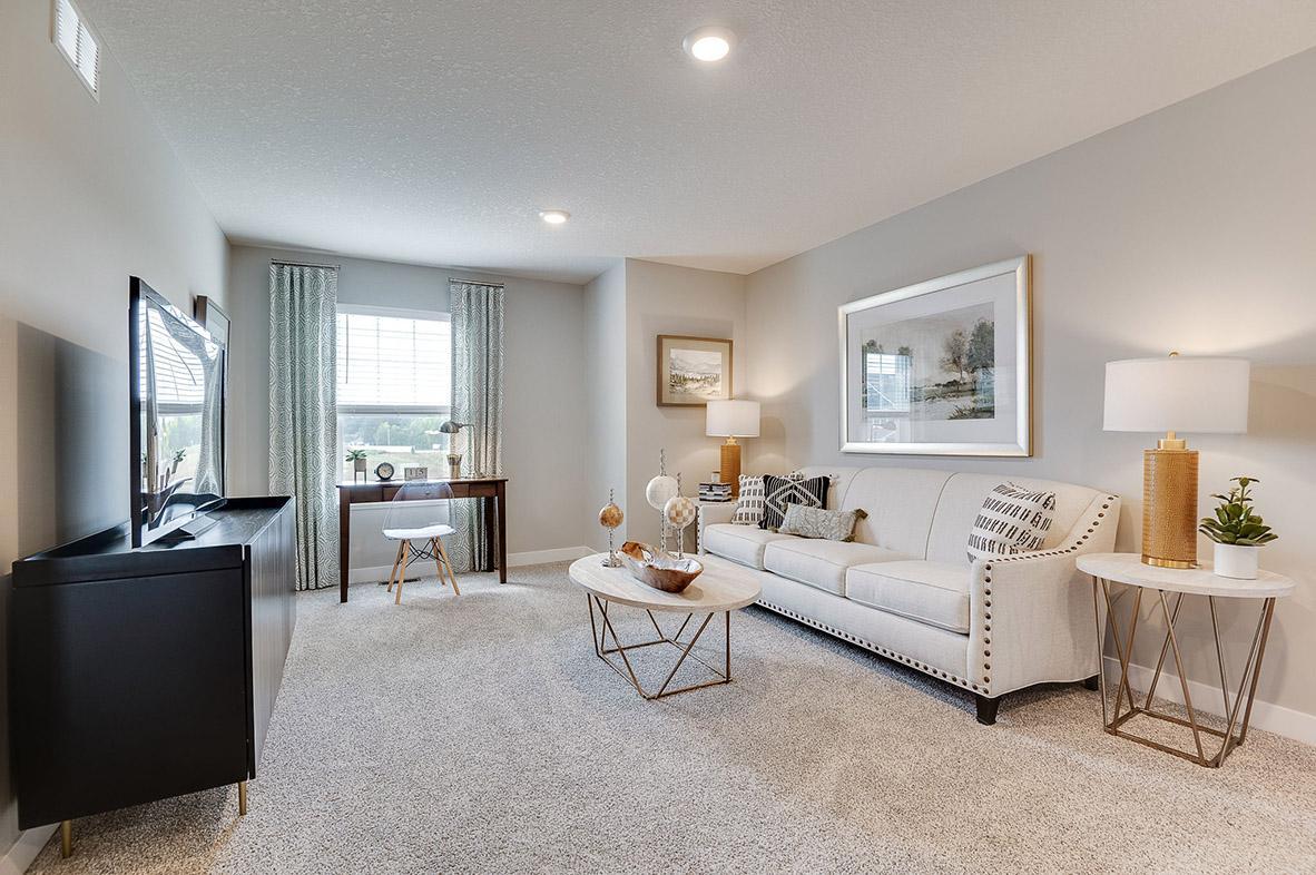 Upstairs versatile loft space. Perfect space to use how you want! Model picture shown. Colors and finishes may vary.
