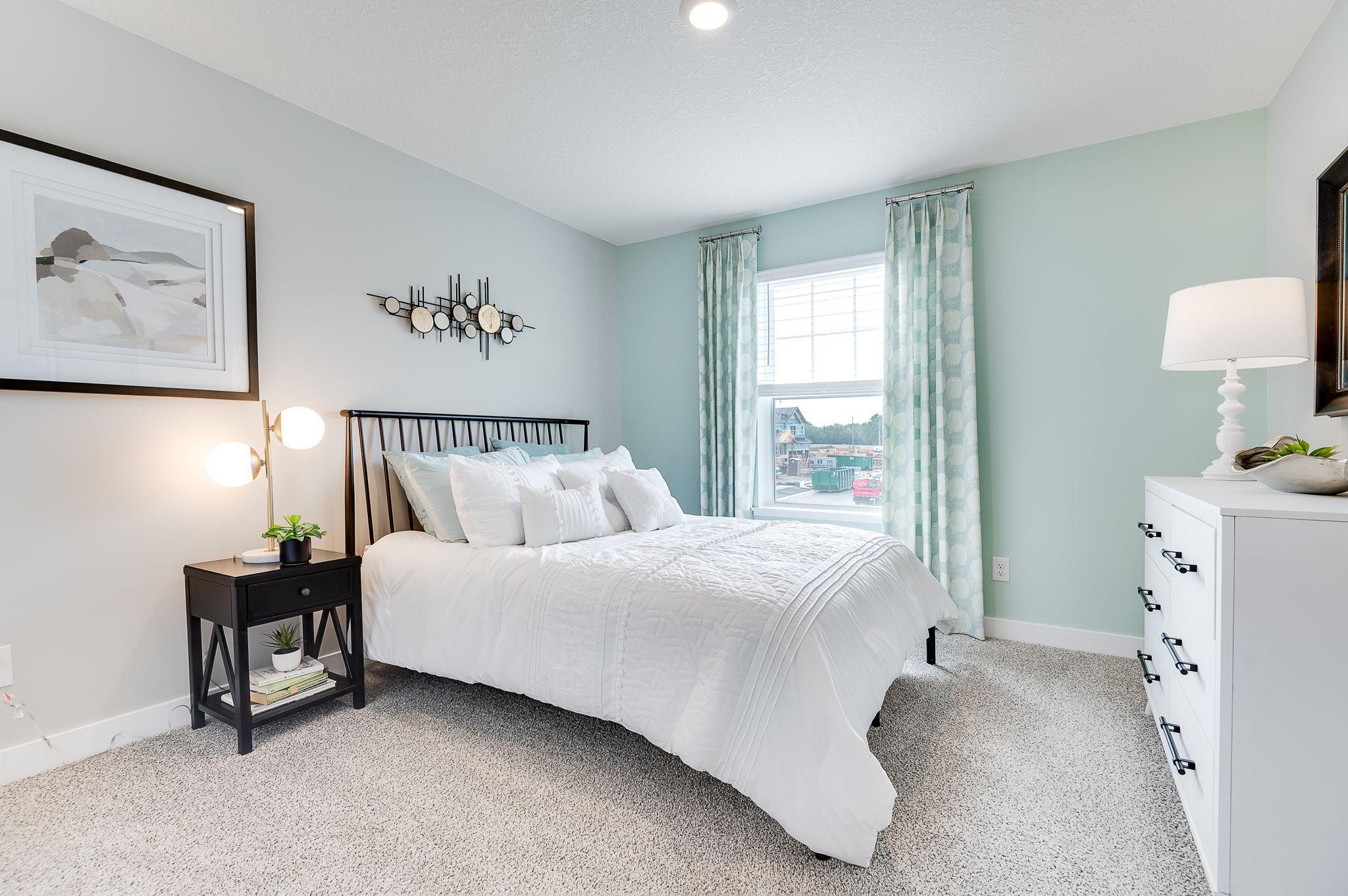Bedroom 2 of 4 upstairs. Model picture shown. Colors and finishes may vary.