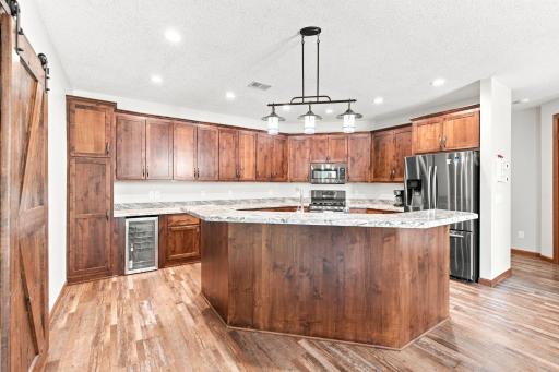 Beautiful custom kitchen with spacious center island, plenty of room to gather and entertain