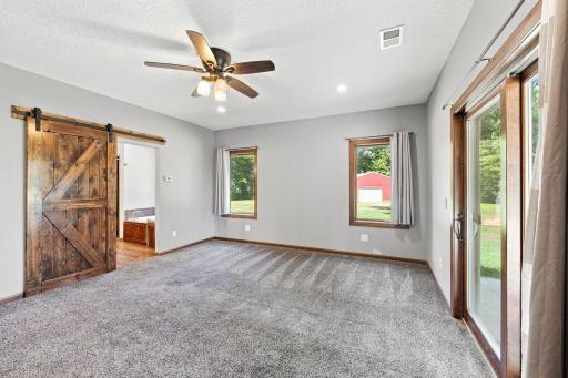 Spacious primary bedroom with private en suite bathroom