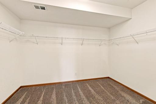 Oversized primary bedroom walk in closet