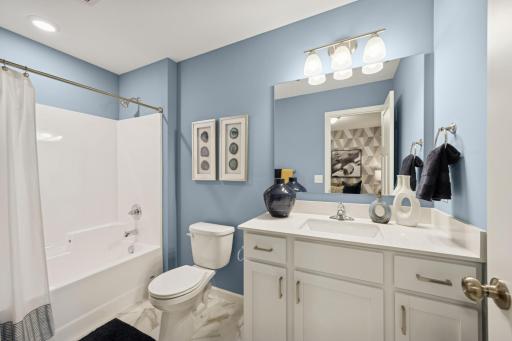 Upstairs full bath - photo is of model home for illustrative purposes