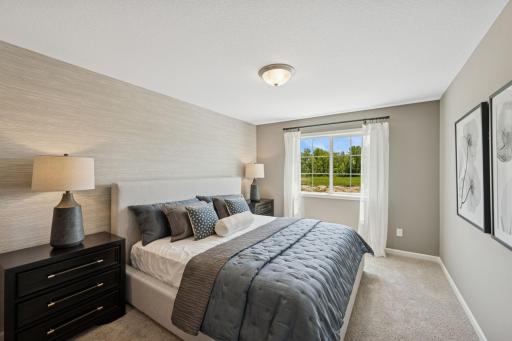 Primary Bedroom - photo is of model home for illustrative purposes