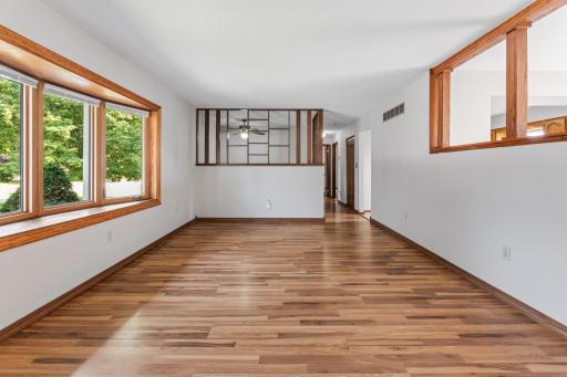 Spacious living room with easy to care for flooring underfoot