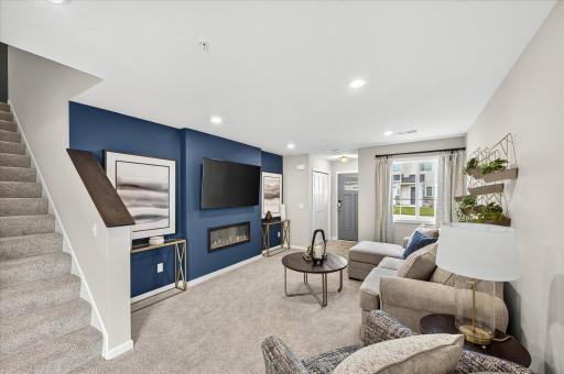 Living Room - photos are of a staged model home of the same floorplan