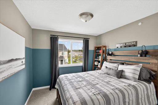 Bedroom 1 - photos are of a staged model home of the same floorplan
