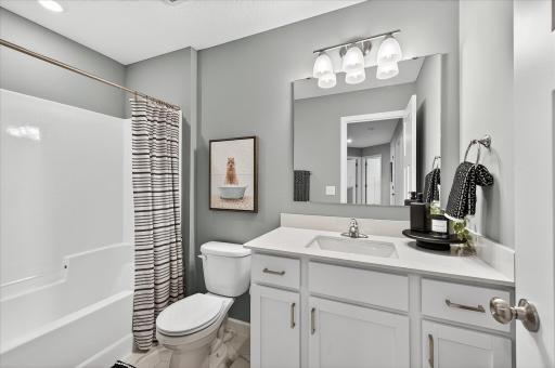 Upstairs Full Bathroom - photos are of a staged model home of the same floorplan