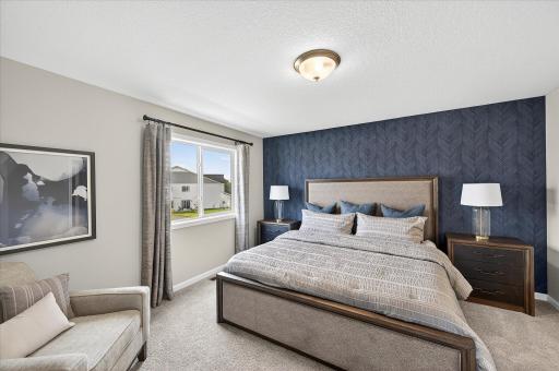 Primary Bedroom - photos are of a staged model home of the same floorplan
