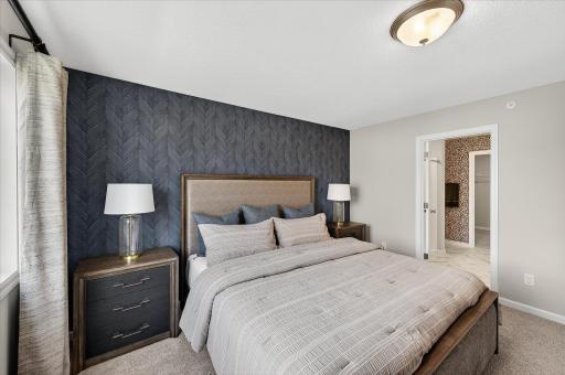 Primary Bedroom - photos are of a staged model home of the same floorplan