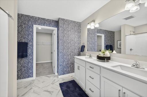 Primary Bathroom - photos are of a staged model home of the same floorplan