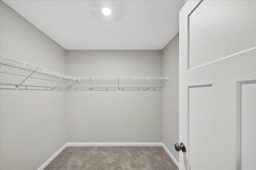 Walk-in Closet - photos are of a staged model home of the same floorplan