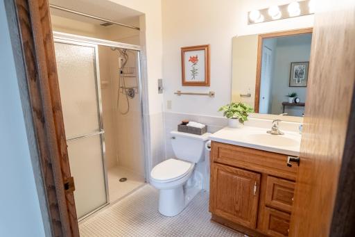 Primary en suite with walk in shower.