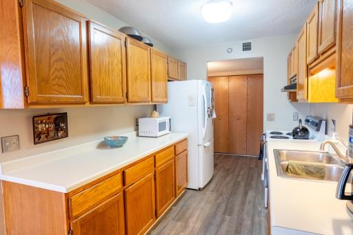Functional kitchen with lots of countertop space and storage.