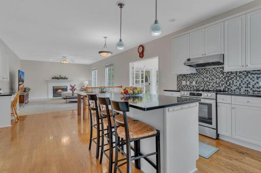Spacious kitchen, center island and granite countertops.
