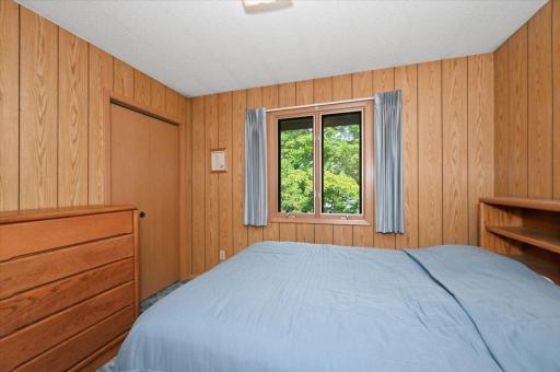 Bedroom across from the bathroom. Fits a queen-sized bed, dresser, night stand and plenty of room to walk around.