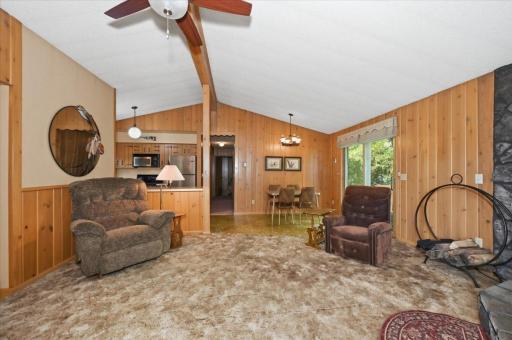 The patio door leads out onto an large deck that overlooks the lake.