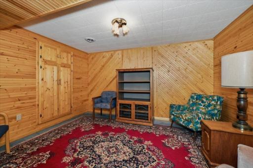 Lower level finished room. Such quality woodworking / finishing provided by the previous owner.