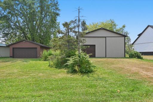 Tons of room for storage and toys! A double garage and a large shop with an overhead door for RV storage and a workshop.
