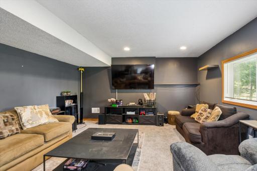 The finished walkout lower level expands your living space with an enormous family room perfect for movie nights, game days, or entertaining. A fifth bedroom and an additional bathroom make this level ideal for guests, or multigenerational living.