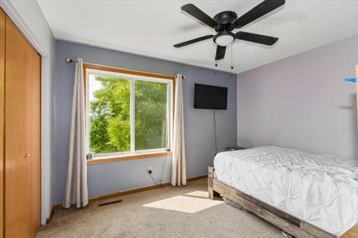 Three additional oversized bedrooms and a full bathroom complete the upper level.