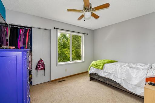 Three additional oversized bedrooms and a full bathroom complete the upper level.