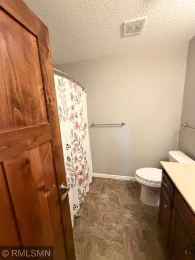 Nice size full bath downstairs for guests and convenience.