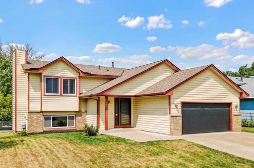 Welcome to 685 107th Ln NW - 5 BR / 2 BA / 2 Car / 2,170 SF / Pond View