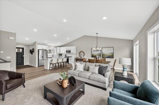 Living room - photos are of a staged model home of the same floorplan. Selections and colors may differ.