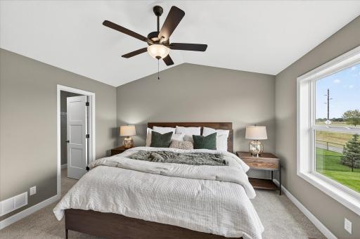 Primary suite - photos are of a staged model home of the same floorplan. Selections and colors may differ.