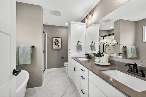 Primary bathroom - photos are of a staged model home of the same floorplan. Selections and colors may differ.