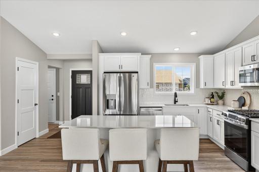 Kitchen - photos are of a staged model home of the same floorplan. Selections and colors may differ.