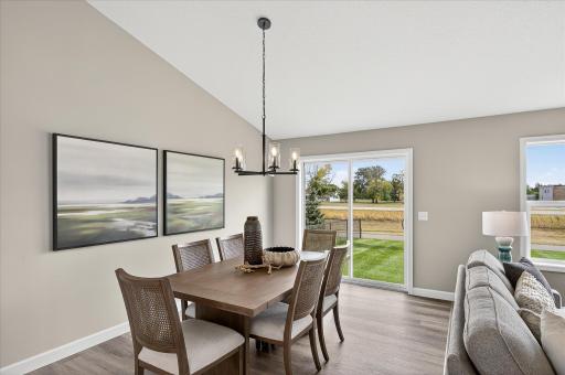 Dining - photos are of a staged model home of the same floorplan. Selections and colors may differ.